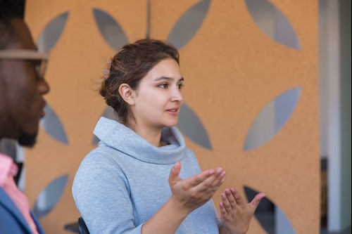 A woman with a assertive personality speaking in public